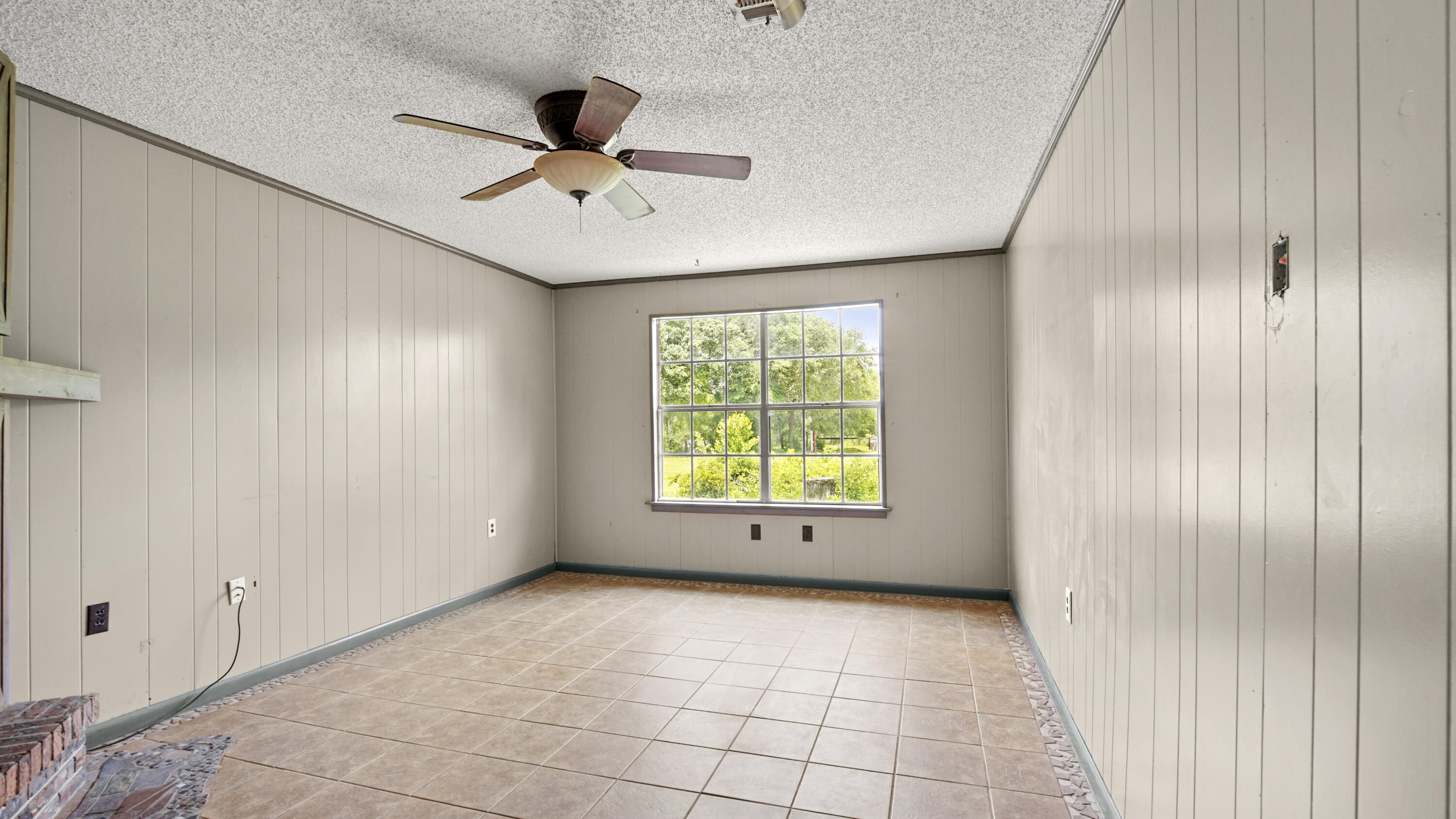 270 Windham Way DeFuniak Springs, FL 32433 - Photo 18 of 51 a view of an empty room with a window