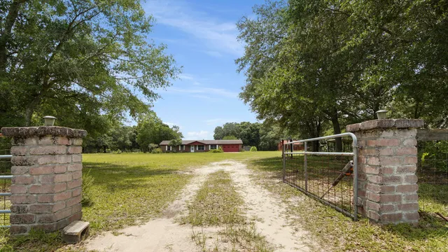 a backyard of a house with lots of green space