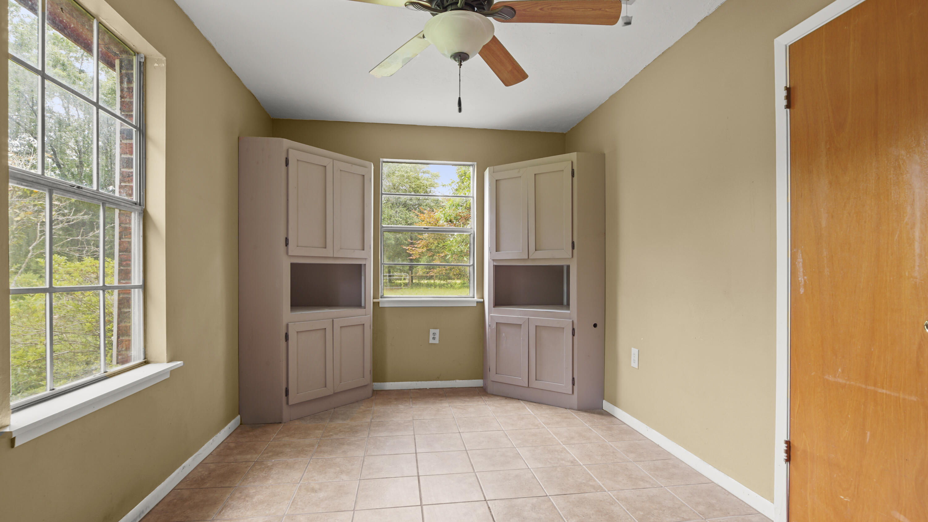 270 Windham Way DeFuniak Springs, FL 32433 - Photo 25 of 51 a view of a kitchen with a cabinet and windows