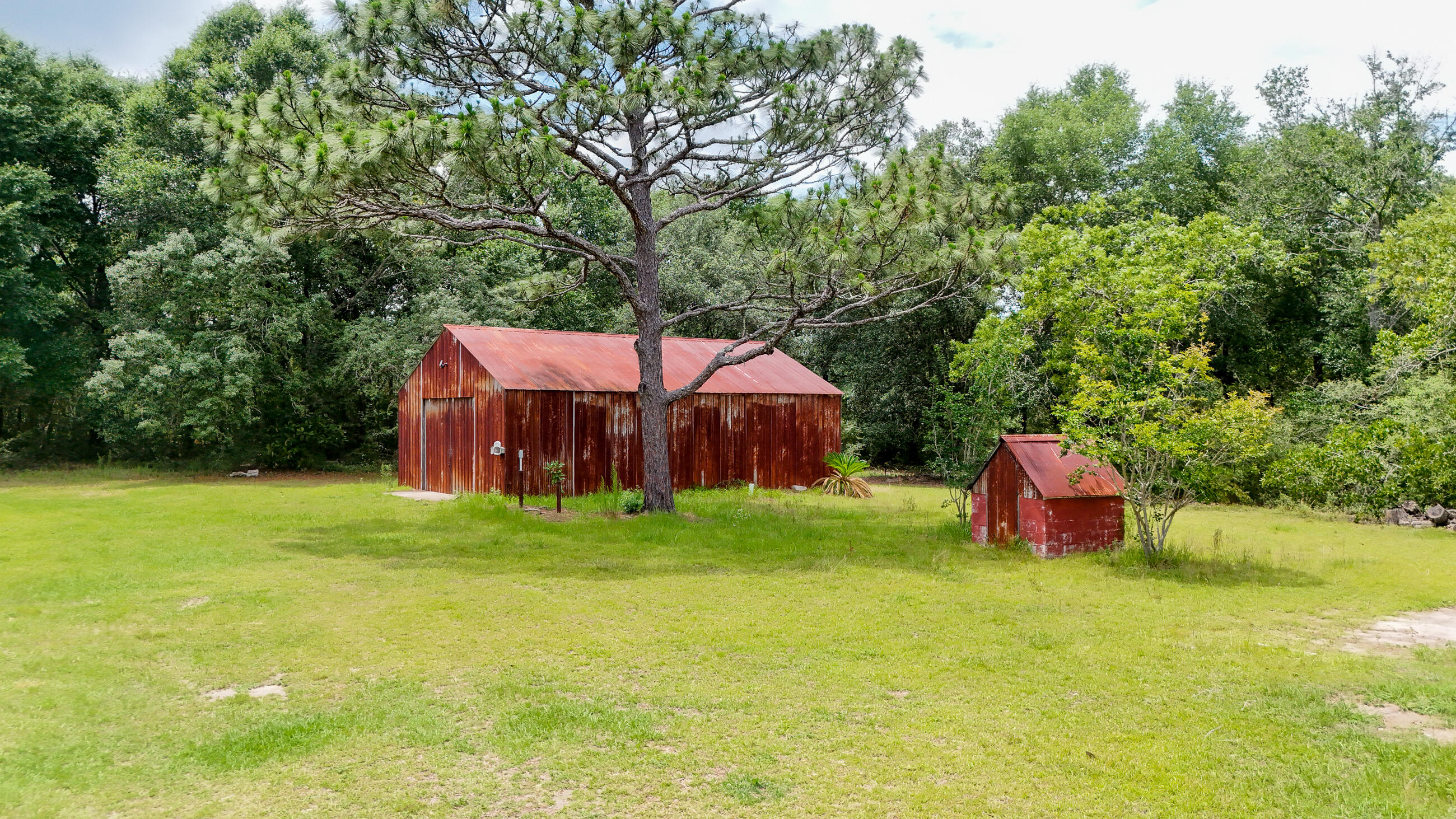 270 Windham Way DeFuniak Springs, FL 32433 - Photo 35 of 51 a backyard of a house with table and chairs