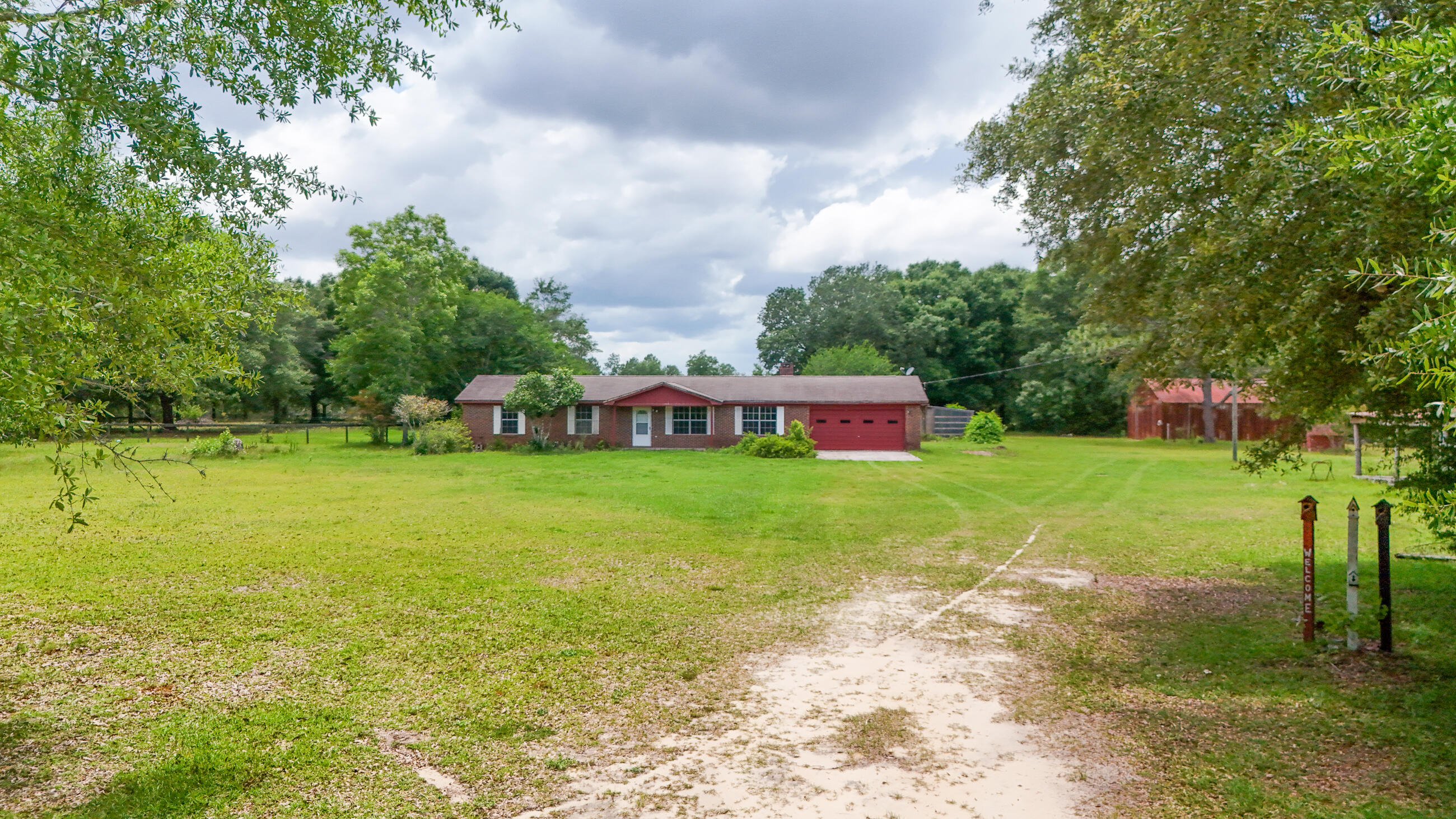 270 Windham Way DeFuniak Springs, FL 32433 - Photo 4 of 51 DJI_20240820234715_0008_D