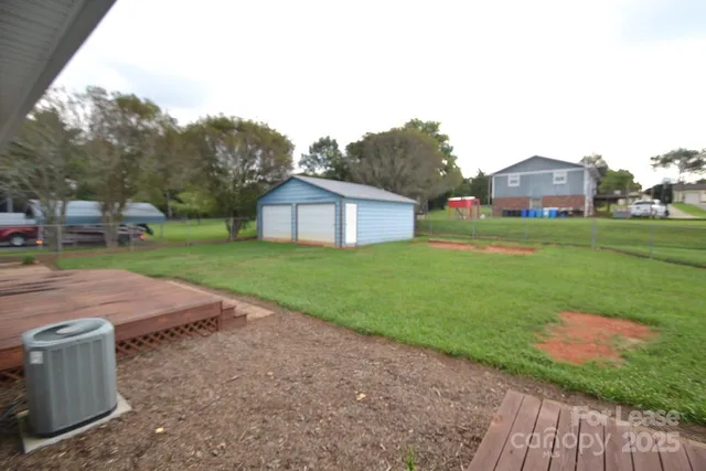 a house view with a garden space