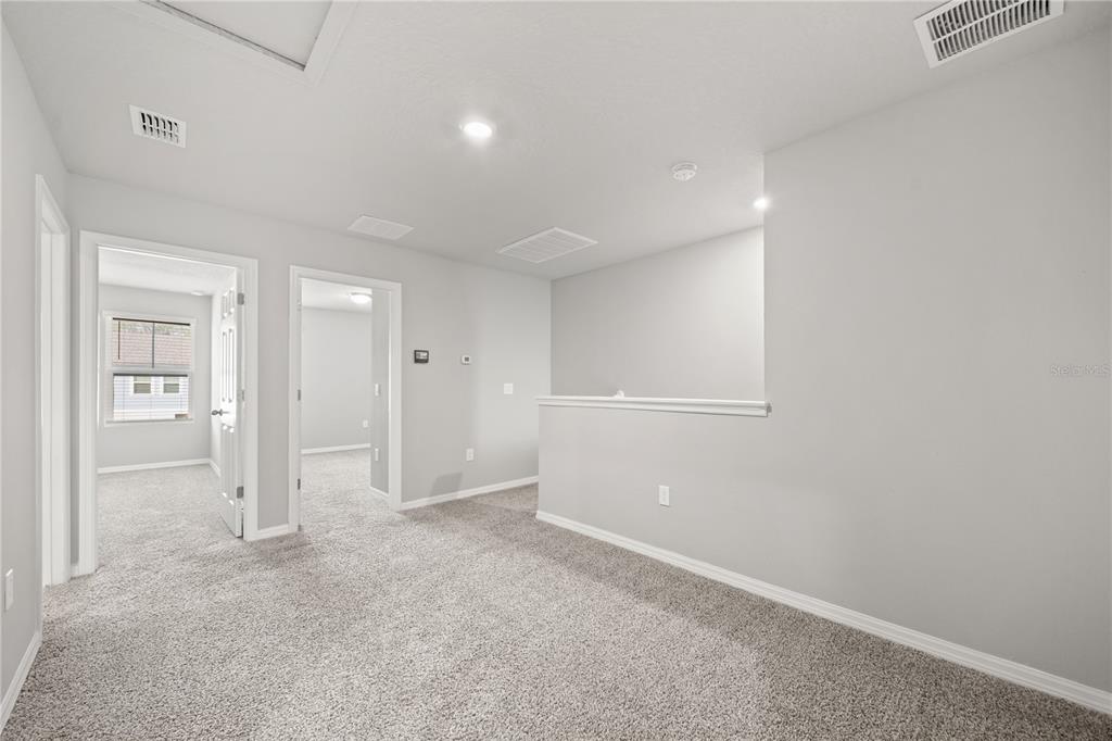 431 Legacy Loop Davenport, FL 33896 - Photo 14 of 25 a view of empty room
