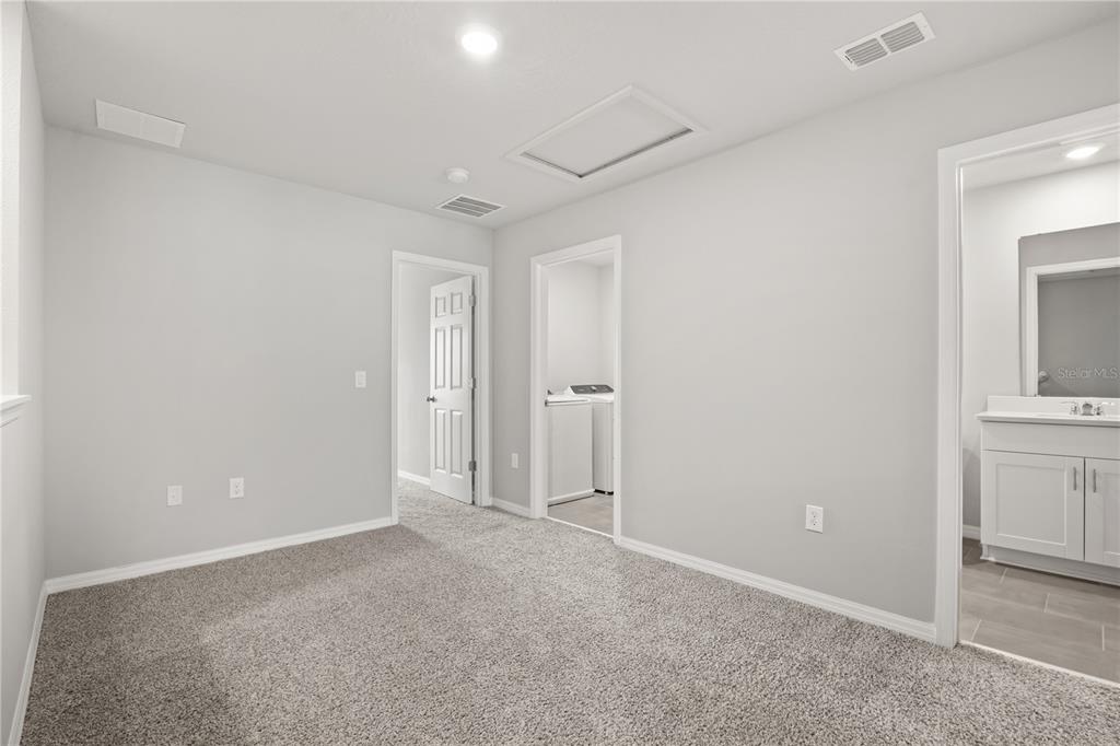431 Legacy Loop Davenport, FL 33896 - Photo 15 of 25 a view of an empty room