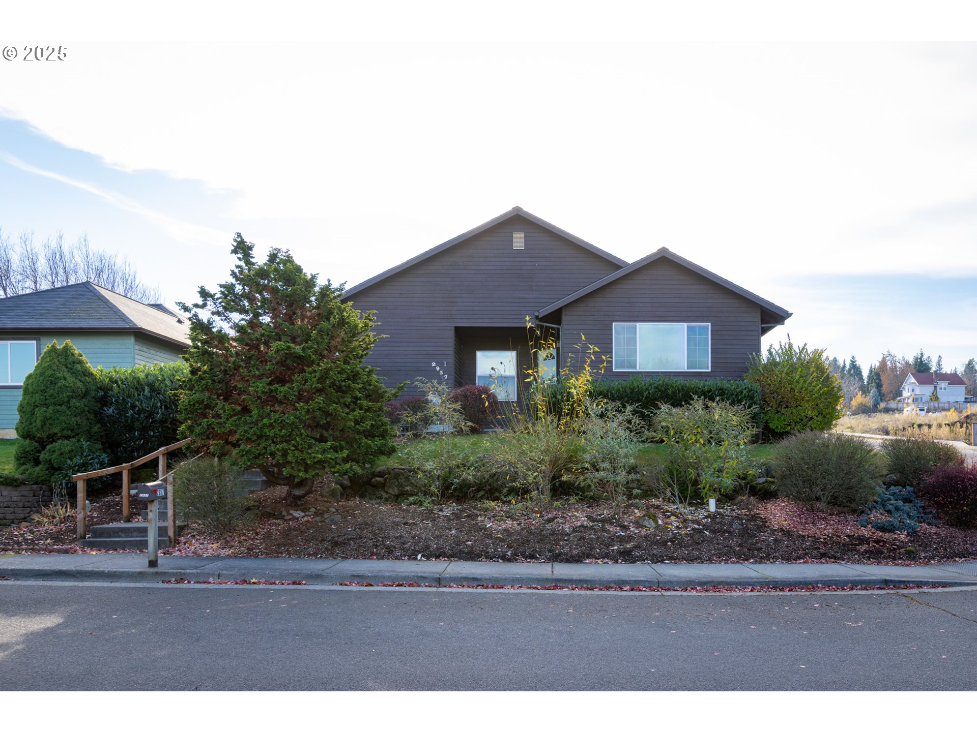 2957 Eugene Street Hood River, OR 97031 - Photo 15 of 42 a front view of a house with a yard