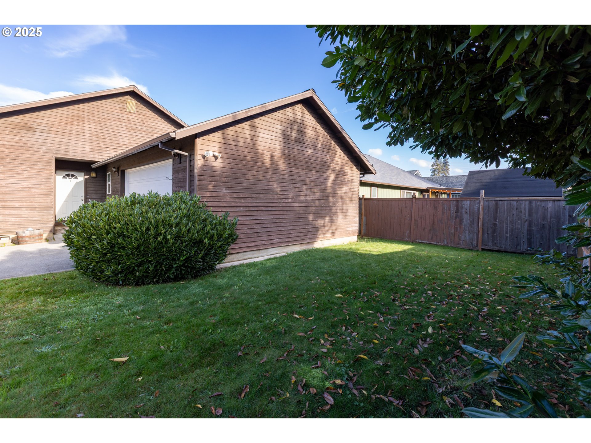 2957 Eugene Street Hood River, OR 97031 - Photo 20 of 42 a backyard of a house with lots of green space