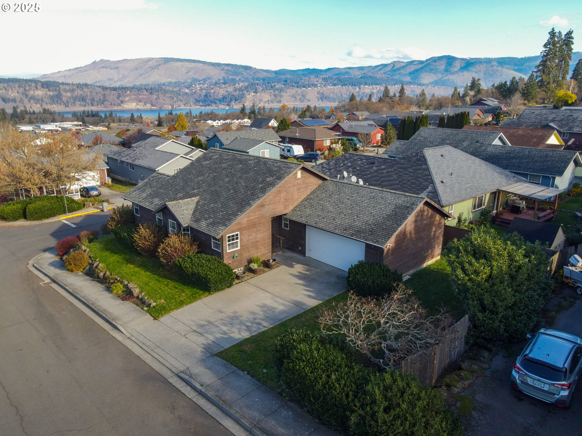 2957 Eugene Street Hood River, OR 97031 - Photo 2 of 42 an aerial view of residential houses with outdoor space and river