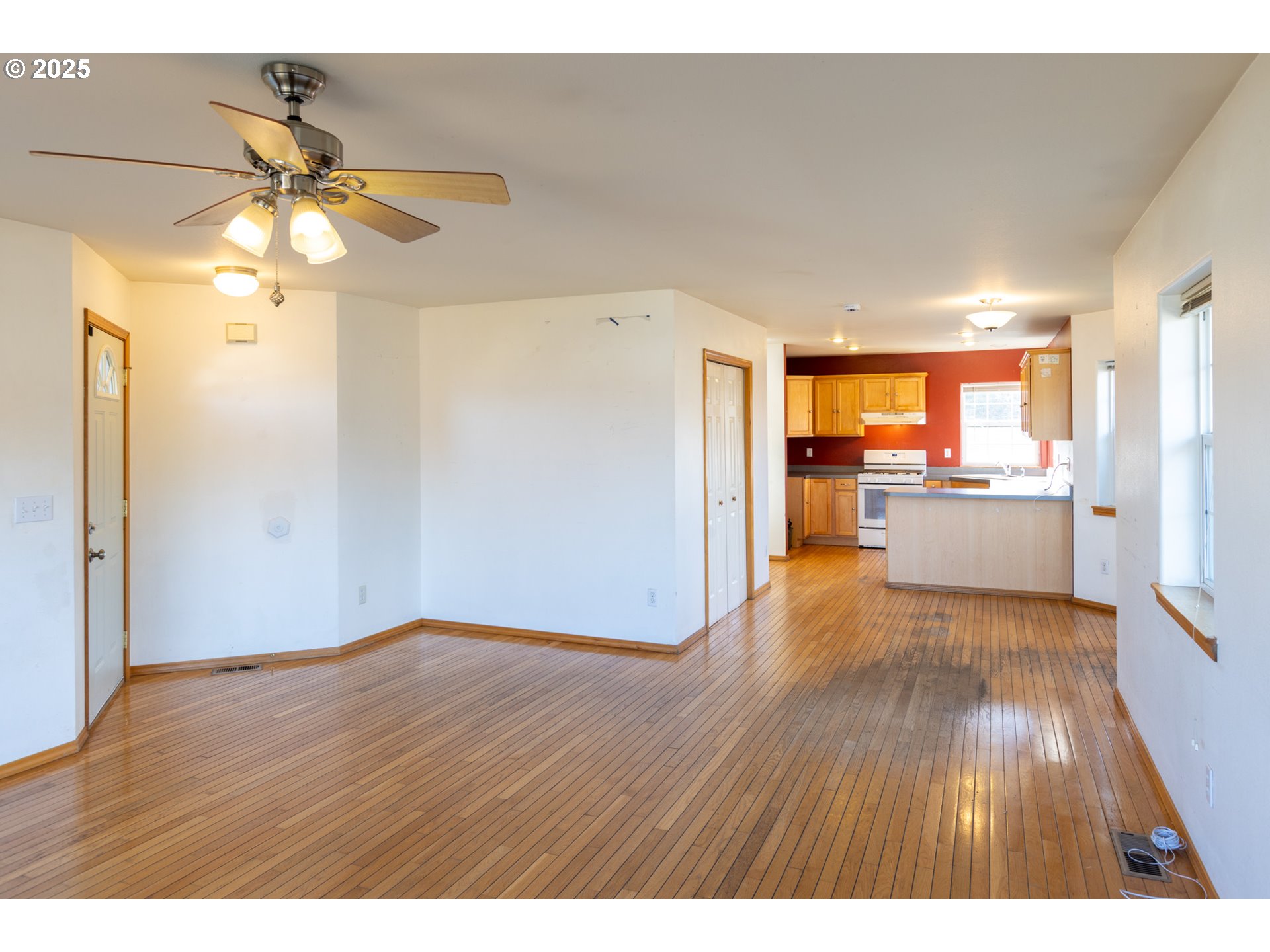 2957 Eugene Street Hood River, OR 97031 - Photo 24 of 42 a view interior of a house wooden floor and a ceiling fan