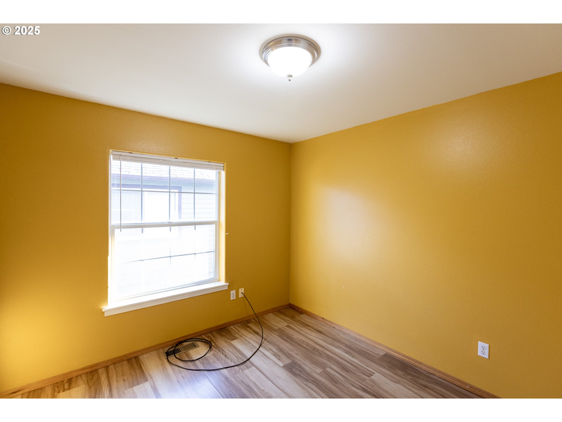 2957 Eugene Street Hood River, OR 97031 - Photo 33 of 42 a view of an empty room with a window