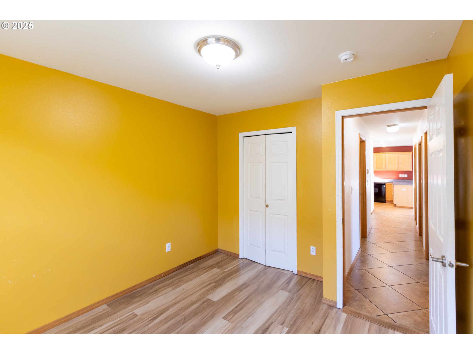 2957 Eugene Street Hood River, OR 97031 - Photo 34 of 42 a view of an empty room with wooden floor