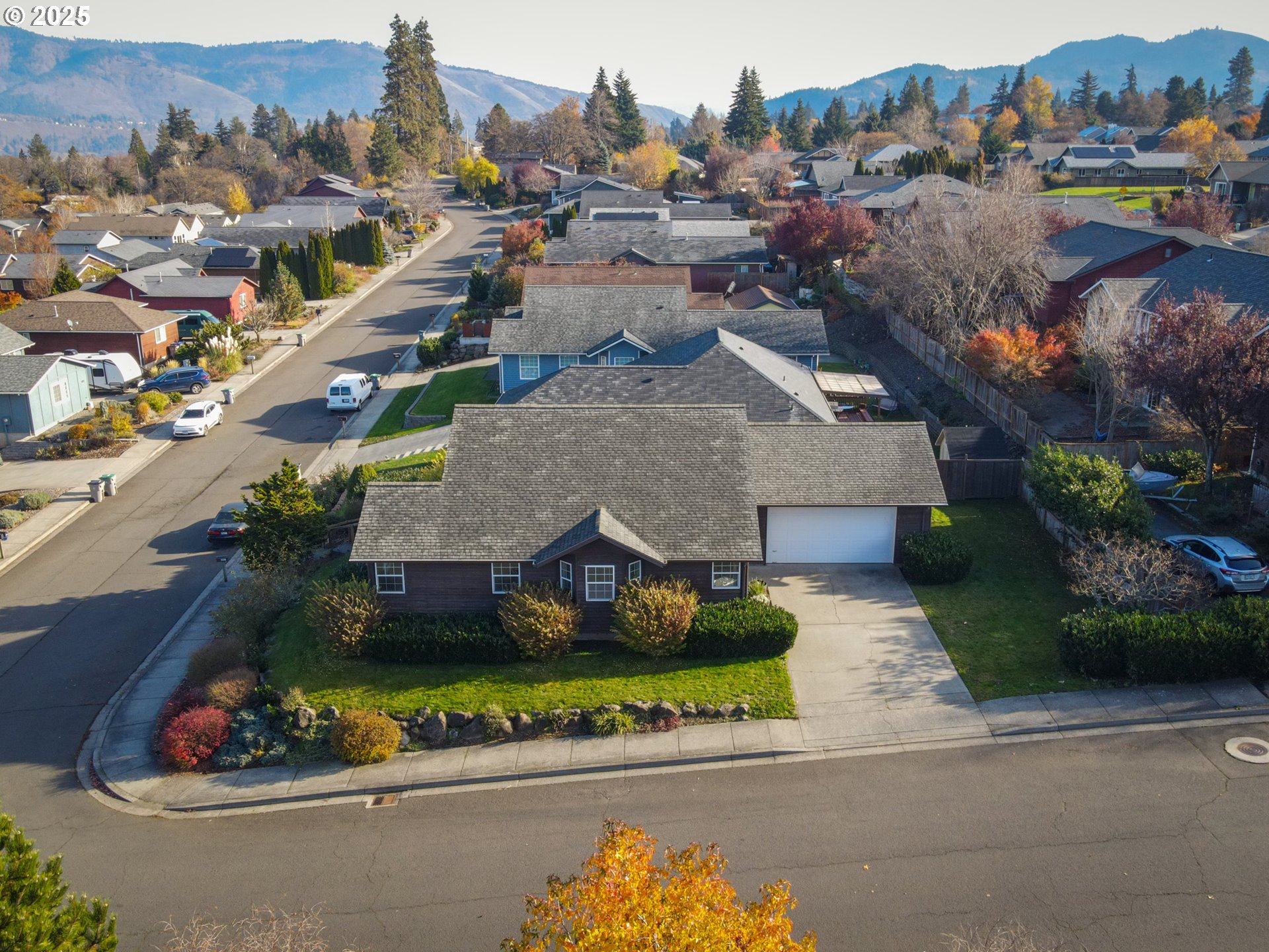 2957 Eugene Street Hood River, OR 97031 - Photo 4 of 42 an aerial view of a house with a garden and lake view