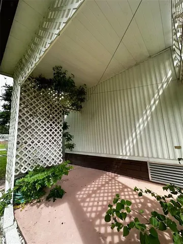 a view of a backyard with a chair