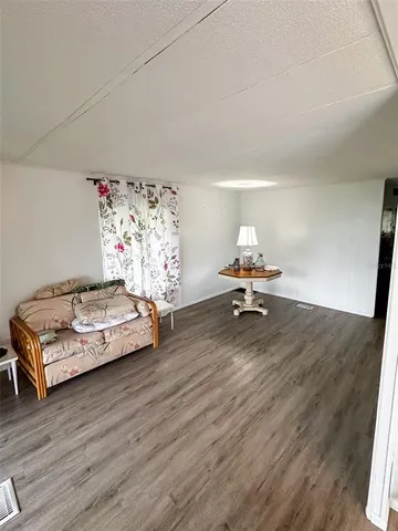 a room with a bed and a window