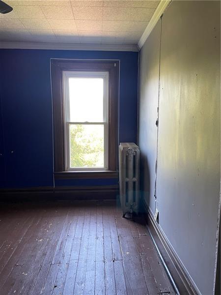 9 Gratz Street Penn, PA 15675 - Photo 19 of 34 a view of room with window and wooden floor