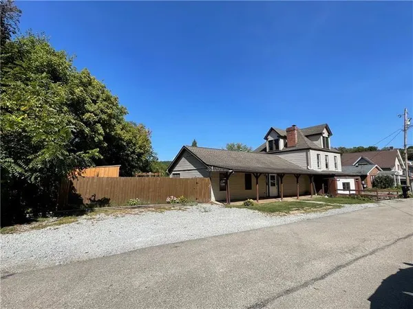 a view of a building with a street