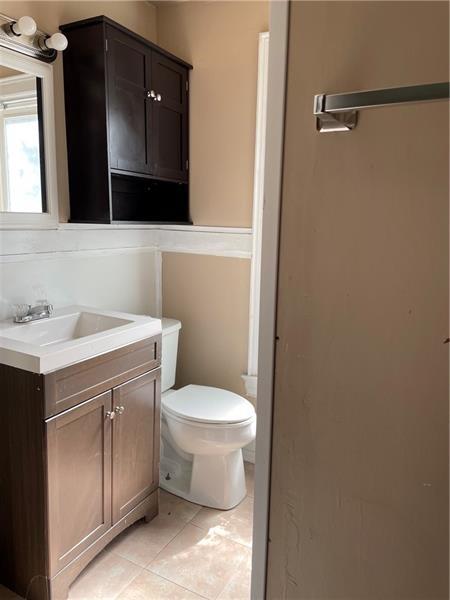 9 Gratz Street Penn, PA 15675 - Photo 24 of 34 a bathroom with a sink and a toilet