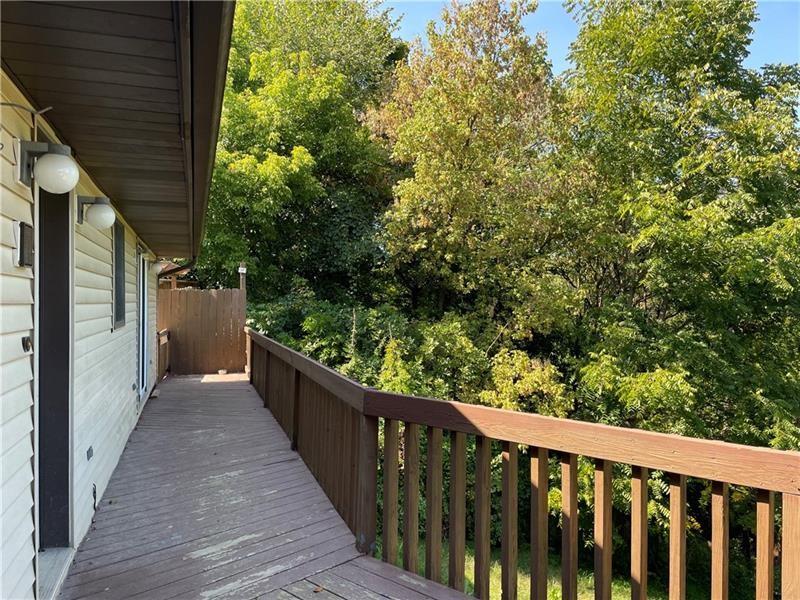 9 Gratz Street Penn, PA 15675 - Photo 33 of 34 a view of a balcony with wooden floor
