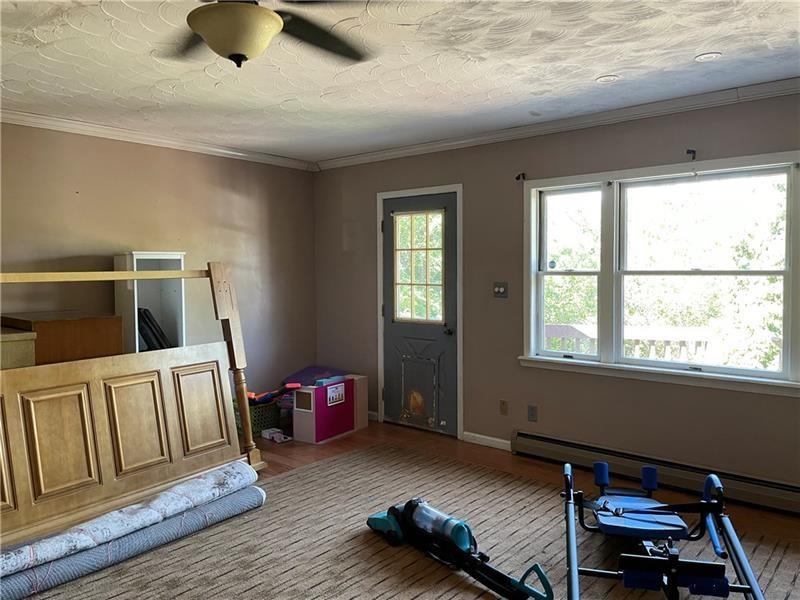 9 Gratz Street Penn, PA 15675 - Photo 10 of 34 a living room with furniture and a window