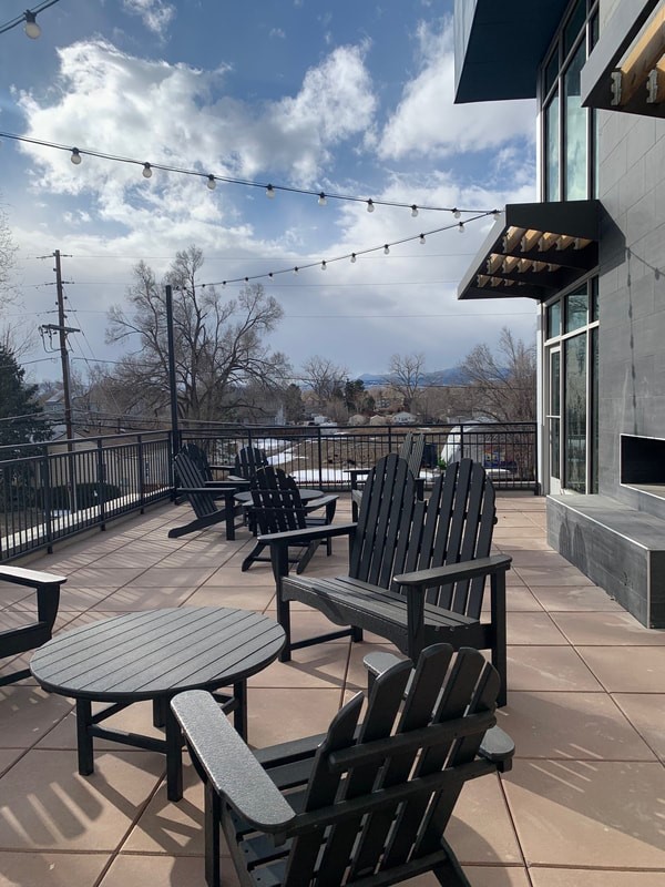 5352 Allison Street Arvada, CO 80002 - Photo 5 of 10 an outdoor space with seating