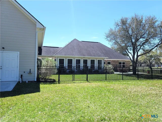 a house view with a garden space