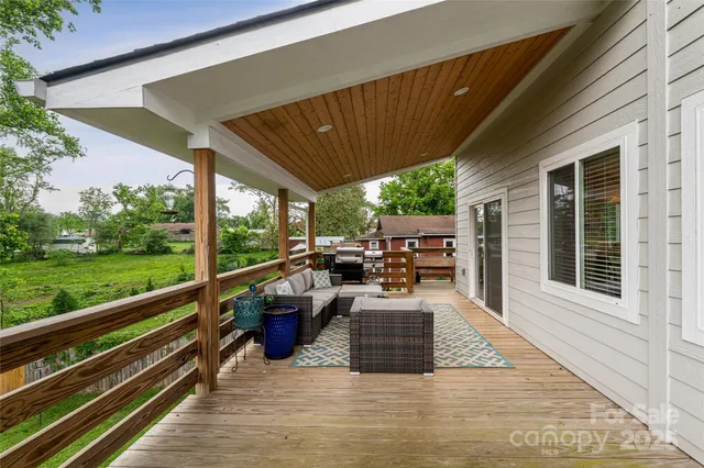 a view of swimming pool with outdoor seating