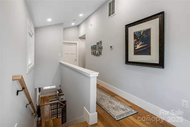 a view of a hallway with workspace