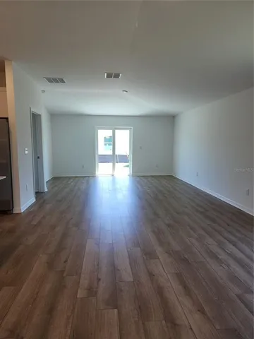a bathroom with a white toilet sitting next to a bathroom sink and a shower