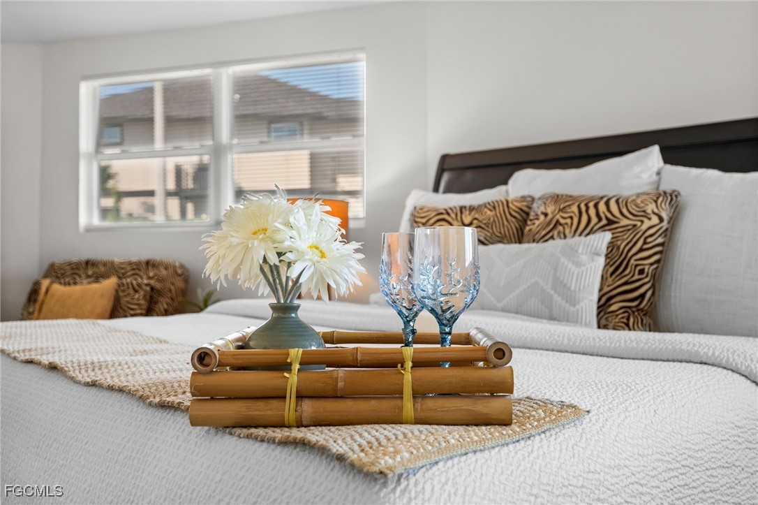 190 Tarpon Road Fort Myers Beach, FL 33931 - Photo 16 of 47 a living room with furniture and a large window