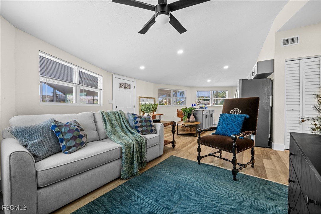 190 Tarpon Road Fort Myers Beach, FL 33931 - Photo 2 of 47 a living room with furniture and a window