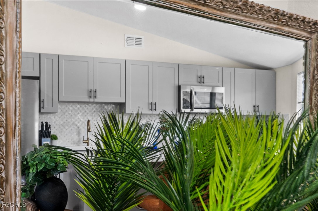 190 Tarpon Road Fort Myers Beach, FL 33931 - Photo 30 of 47 a view of a potted plant in a kitchen