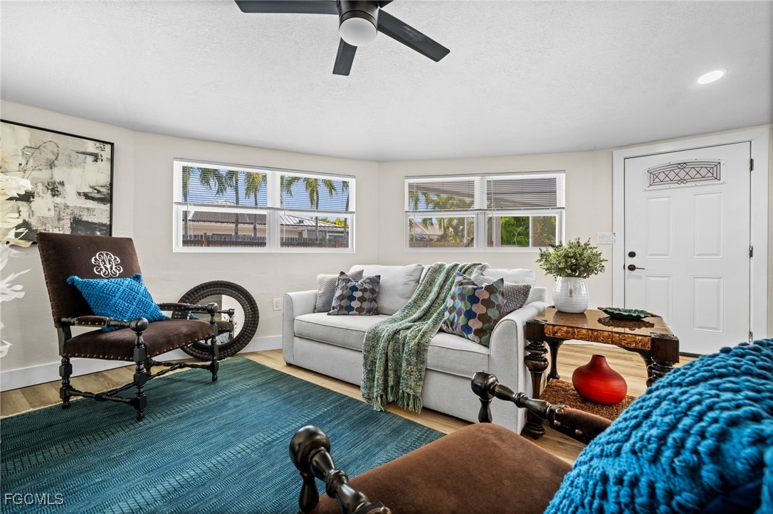 190 Tarpon Road Fort Myers Beach, FL 33931 - Photo 4 of 47 a bedroom with furniture and wooden floor