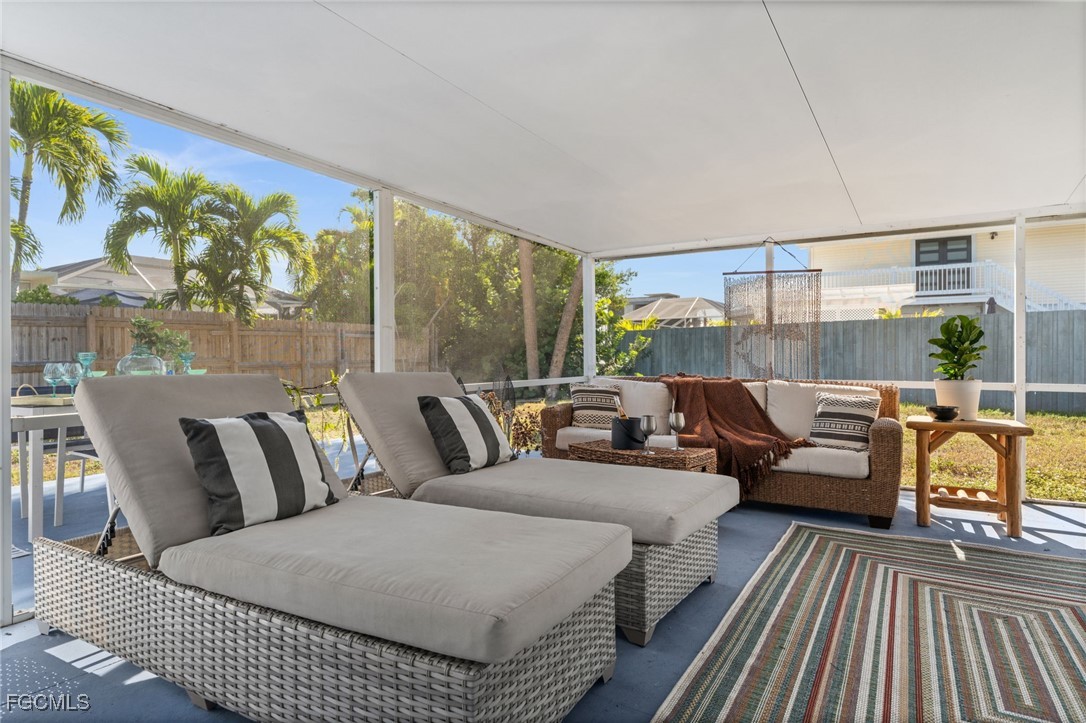 190 Tarpon Road Fort Myers Beach, FL 33931 - Photo 44 of 47 a living room with furniture and a large window
