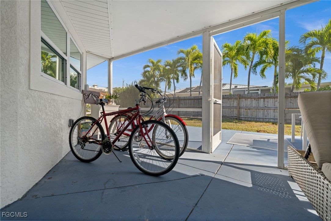 190 Tarpon Road Fort Myers Beach, FL 33931 - Photo 46 of 47 a view of bike storage next to a yard