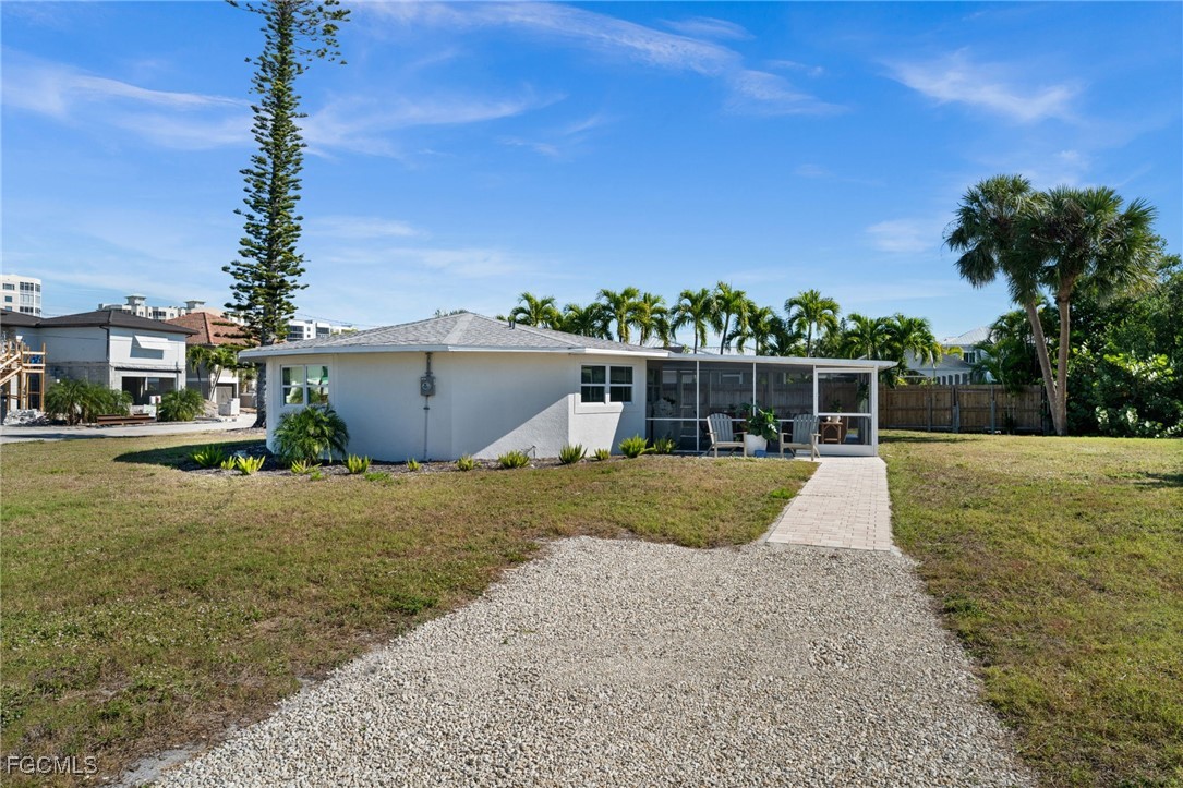 190 Tarpon Road Fort Myers Beach, FL 33931 - Photo 47 of 47 a view of an house with backyard space and balcony