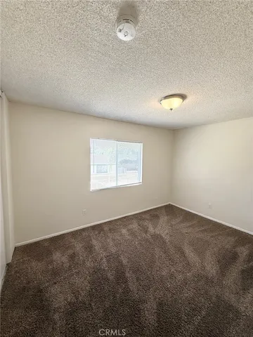 an empty room with a workbench