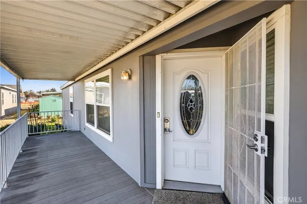 an empty room with kitchen dining table and chairs