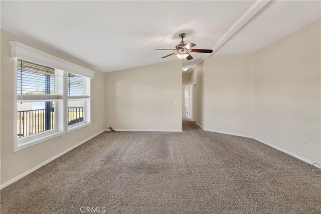 a kitchen with stainless steel appliances granite countertop a stove refrigerator sink and cabinets