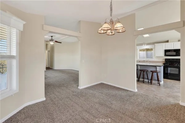 a bathroom with a tub sink and a mirror