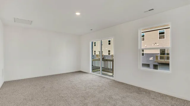 a view of empty room with windows