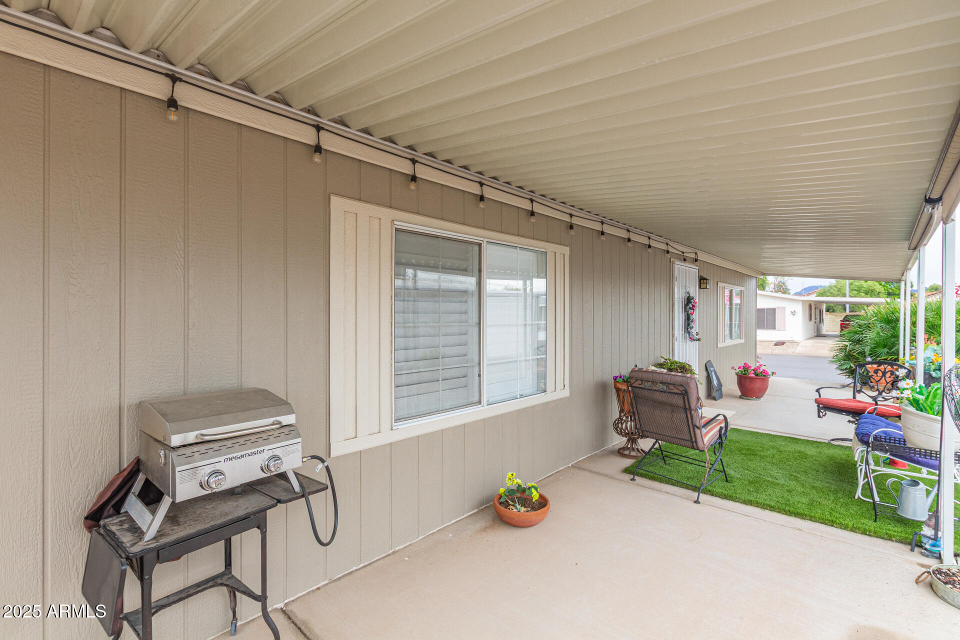 1102 South 114th Street, Unit 72 Mesa, AZ 85208 - Photo 10 of 20 a outdoor space with a patio