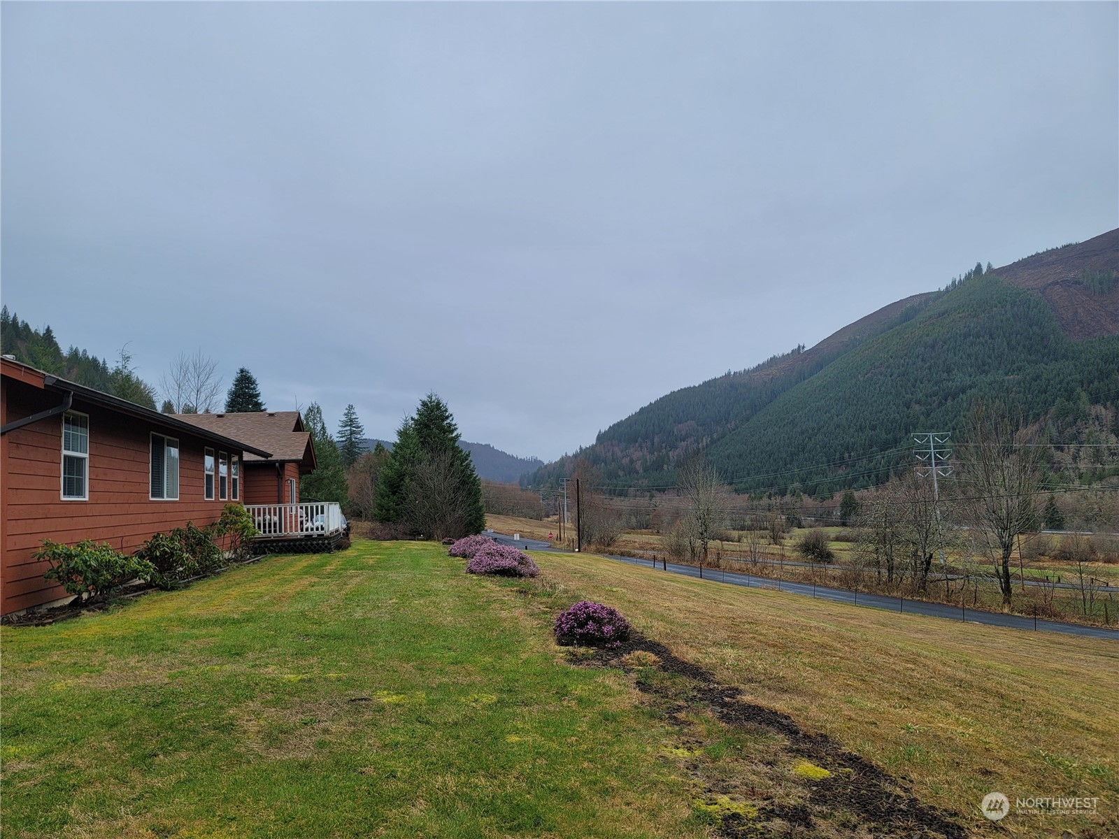 104 Compton Road Morton, WA 98356 - Photo 11 of 35 a view of house with outdoor space and garden