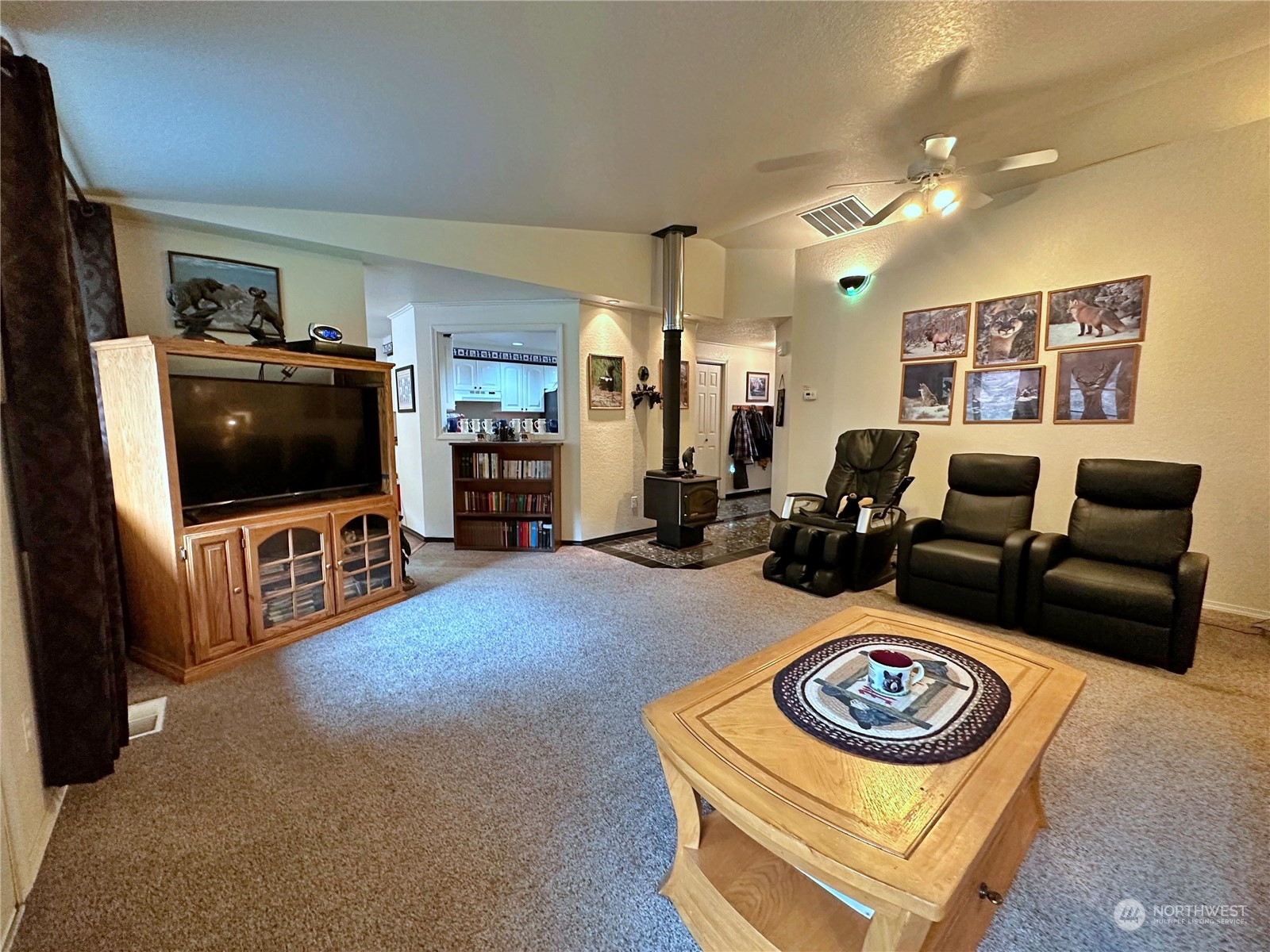 104 Compton Road Morton, WA 98356 - Photo 13 of 35 a living room with furniture and a flat screen tv