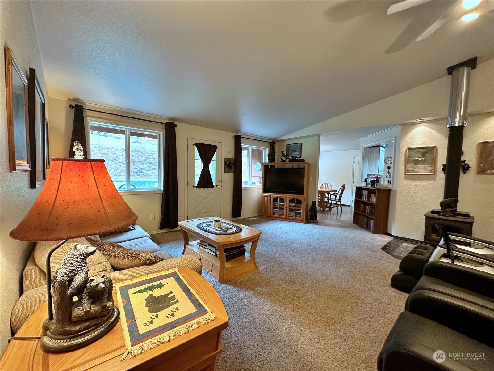 104 Compton Road Morton, WA 98356 - Photo 15 of 35 a living room with furniture and a flat screen tv