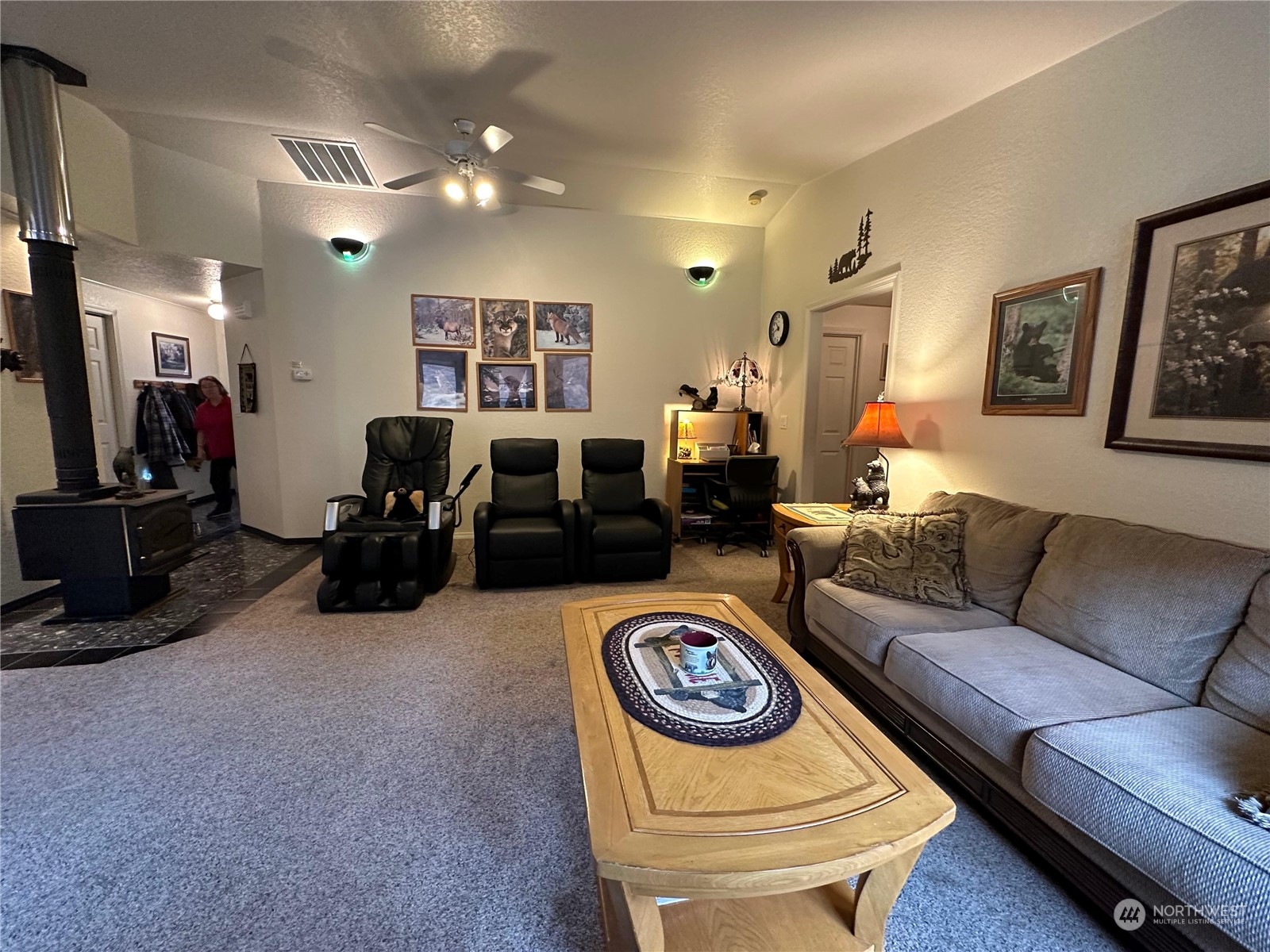 104 Compton Road Morton, WA 98356 - Photo 16 of 35 a living room with furniture and a flat screen tv