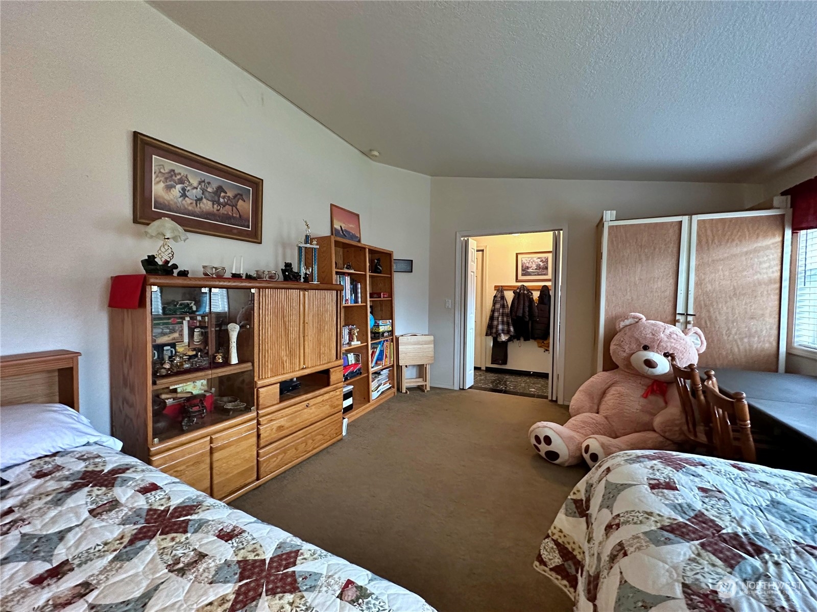 104 Compton Road Morton, WA 98356 - Photo 22 of 35 a bed room with a bed and a tv