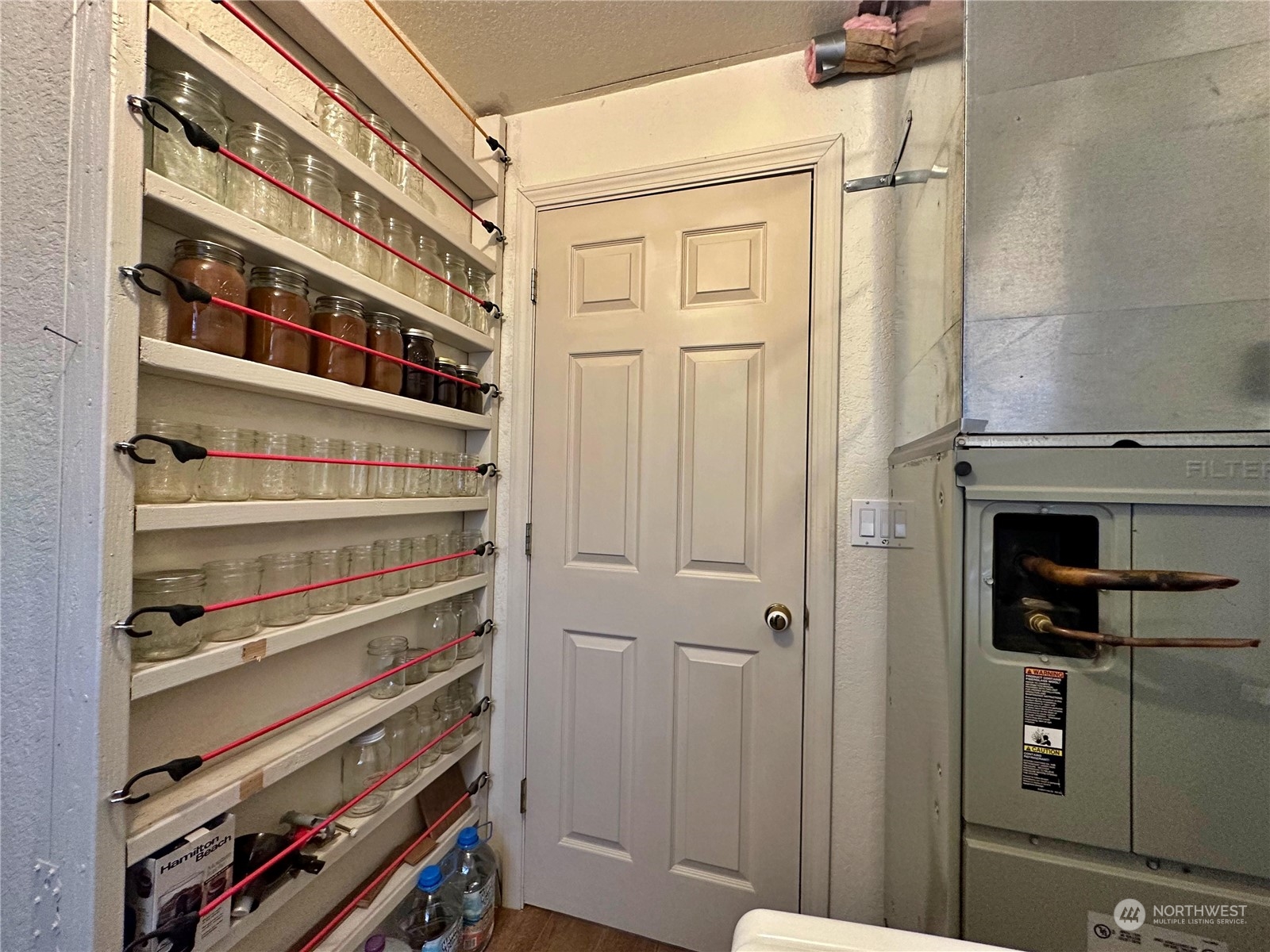 104 Compton Road Morton, WA 98356 - Photo 24 of 35 a view of walk in closet with empty racks