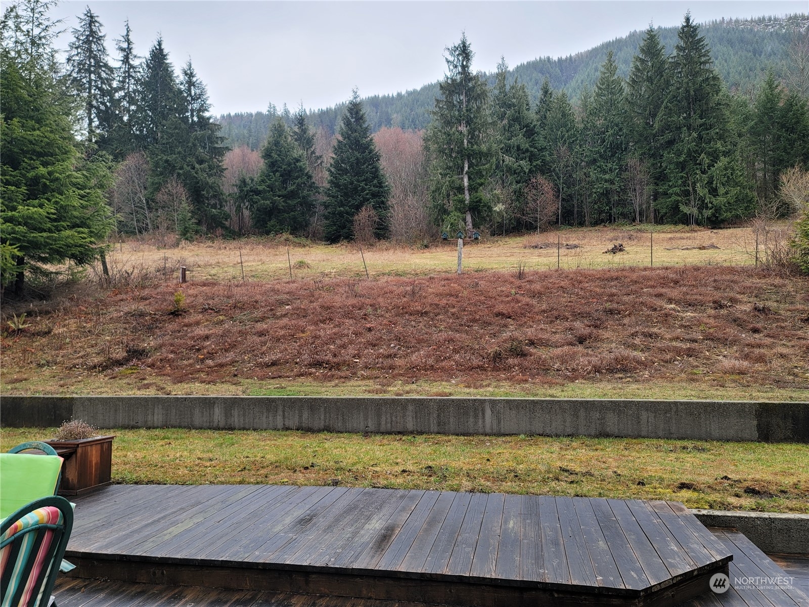 104 Compton Road Morton, WA 98356 - Photo 26 of 35 a view of a swimming pool with a yard