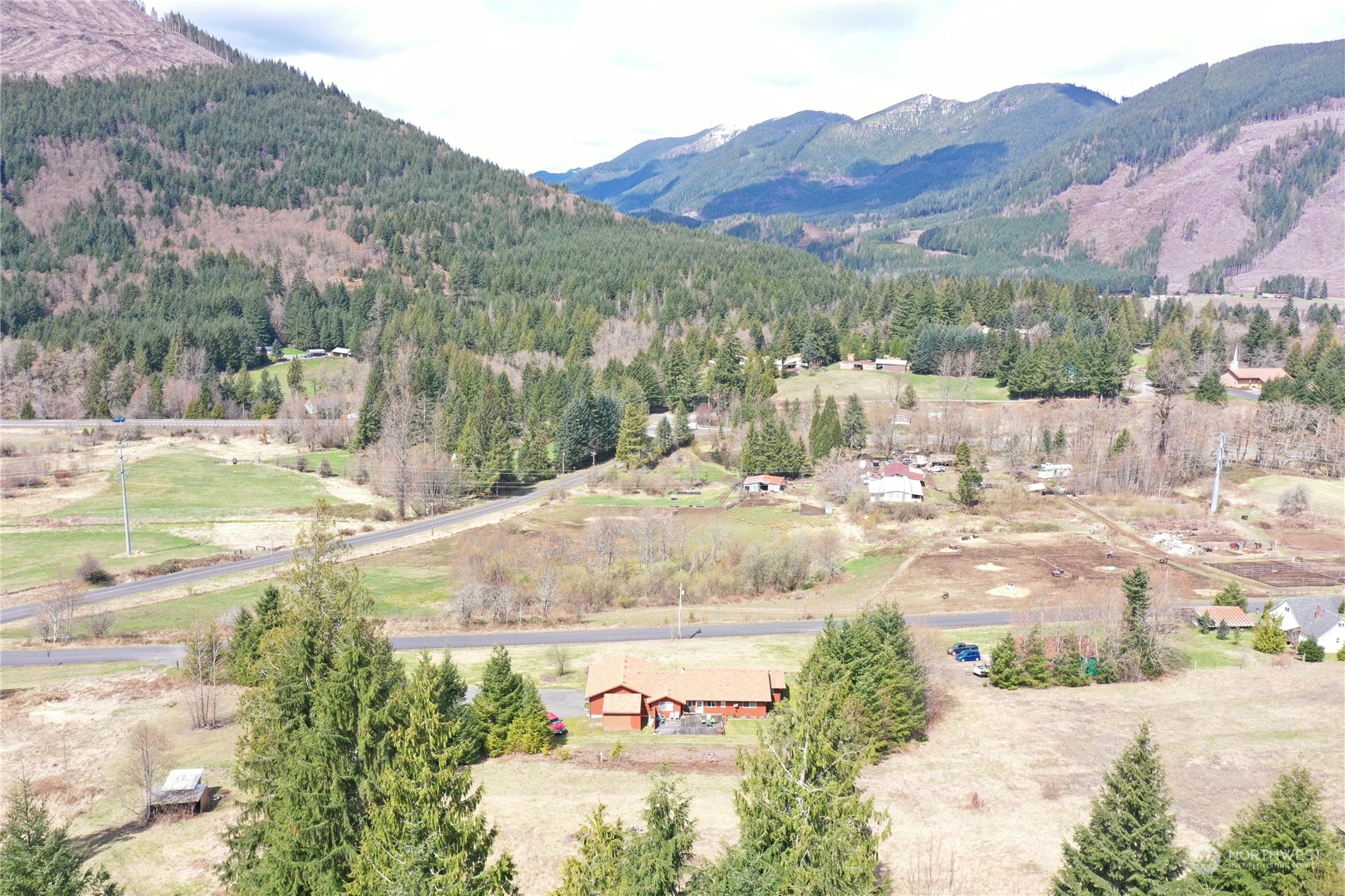 104 Compton Road Morton, WA 98356 - Photo 4 of 35 a view of a town with mountains in the background