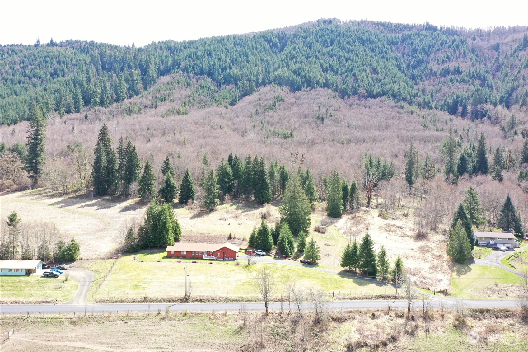 104 Compton Road Morton, WA 98356 - Photo 6 of 35 a view of a house with a yard