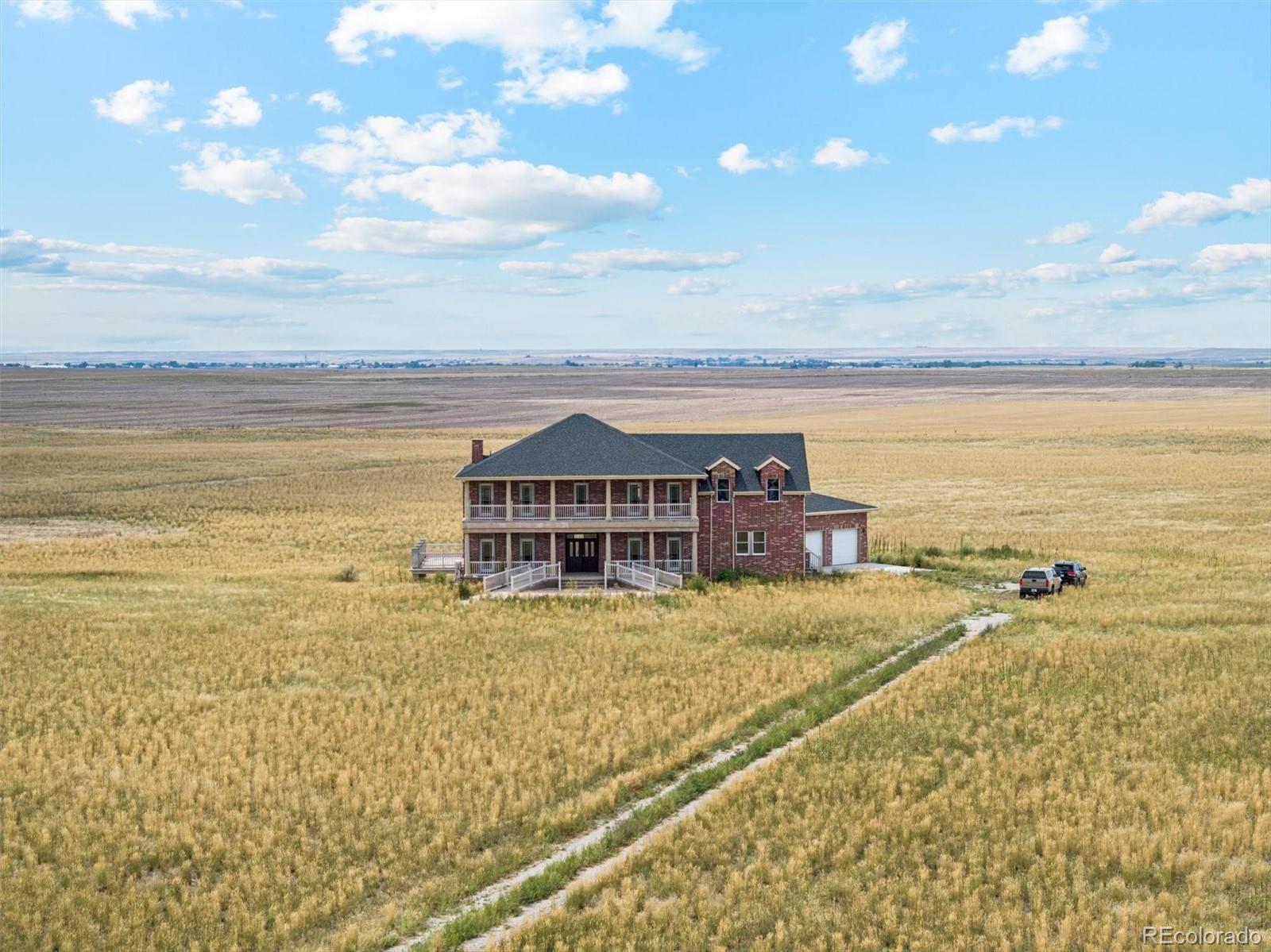 2105 Timberlake Road Byers, CO 80103 - Photo 45 of 48 a view of an ocean with a nearby beach